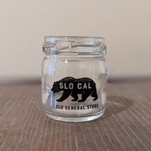 Mason jar shot glass with "SLO CAL" and "SLO General Store" text and a black bear.